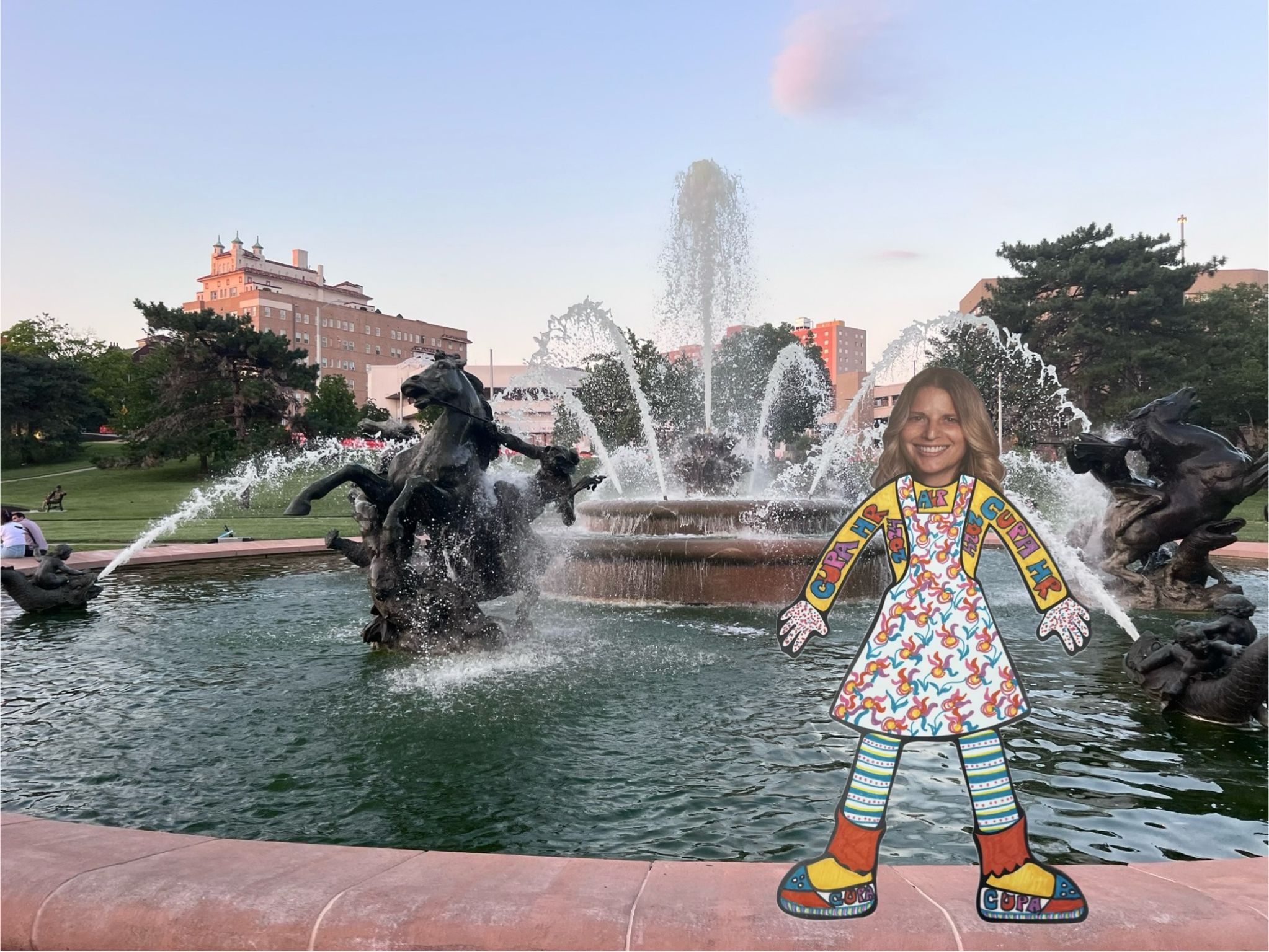 Roamin' Robyn paper doll standing by a fountain in a Kansas City Park